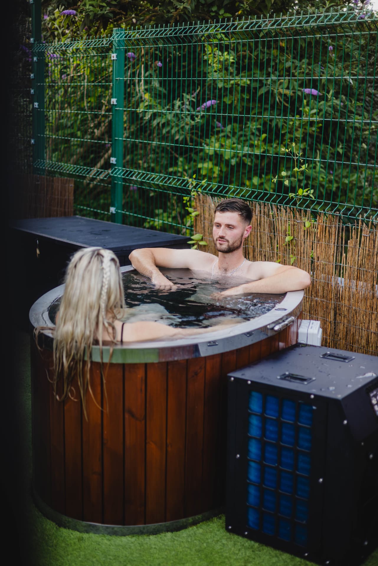 Guests relaxing in the outdoor cold plunge